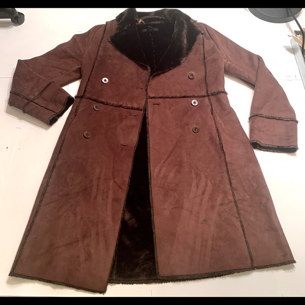 The limited brown fur and suede coat